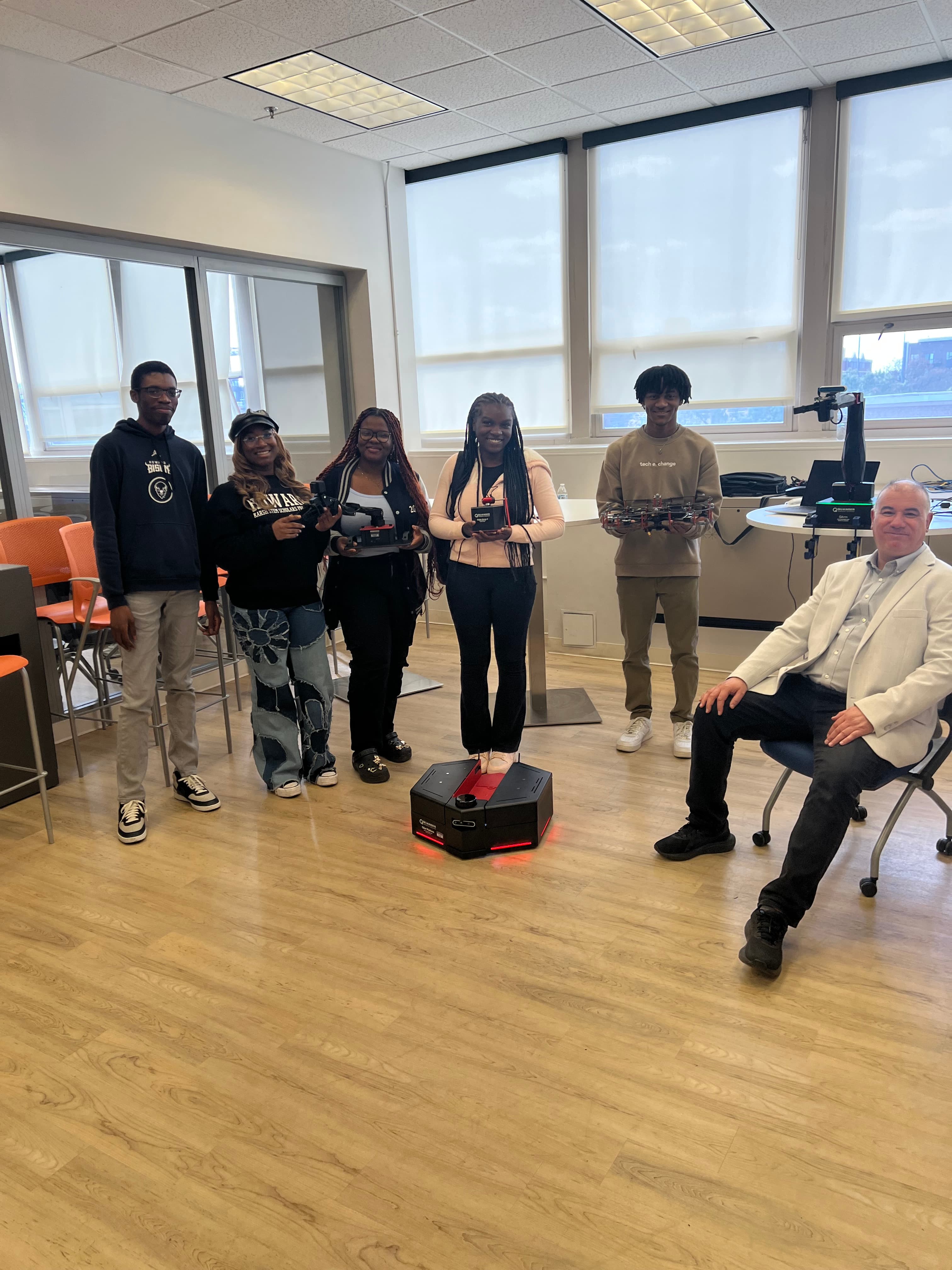 Students working with QCar and QDrone platforms in the AVRC Lab